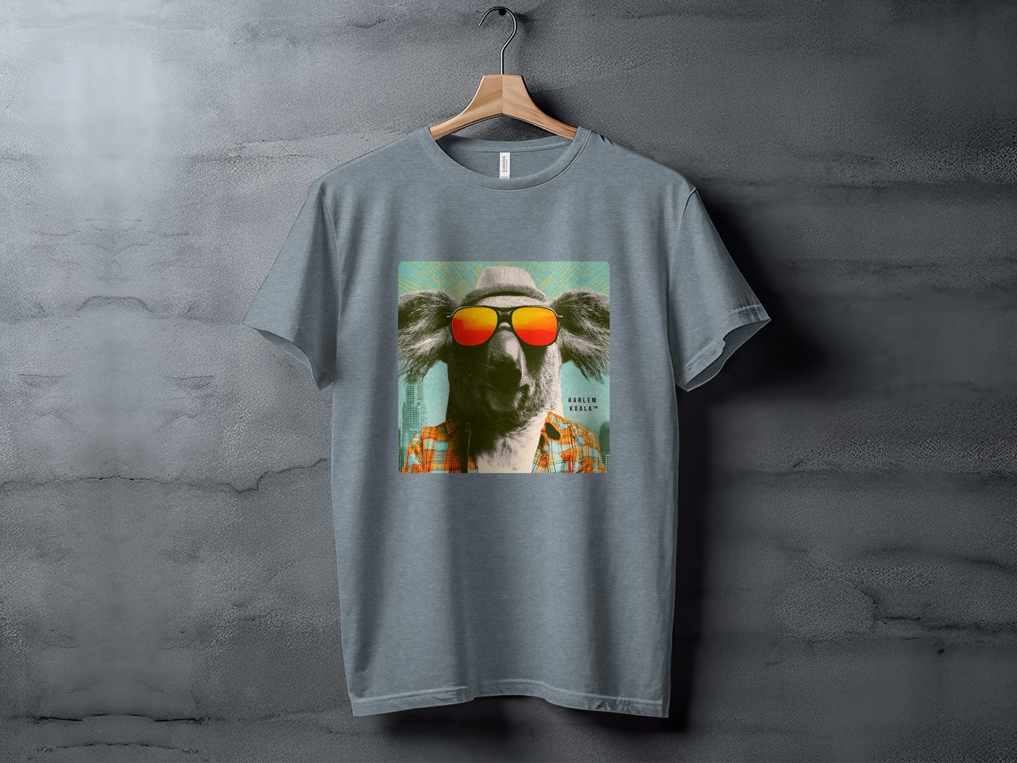 Grey t-shirt with a stylized koala wearing sunglasses and a hat.