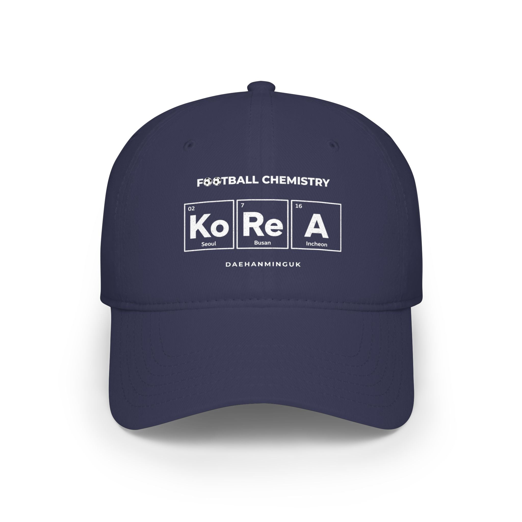 Navy baseball cap with "FOOTBALL CHEMISTRY" and "KoRe A" in periodic table style.