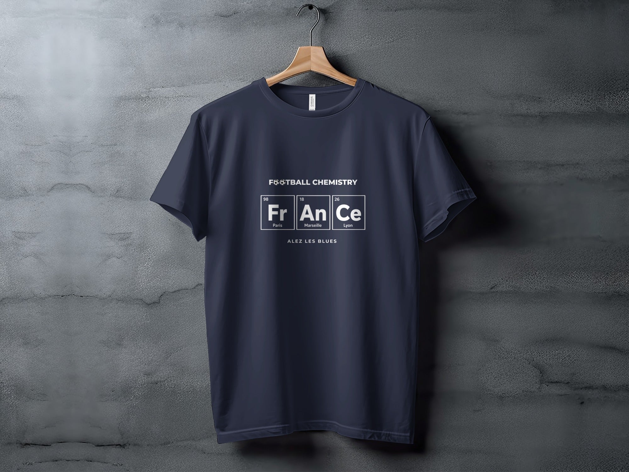 Navy t-shirt with "Football Chemistry" design featuring periodic table elements and city names.