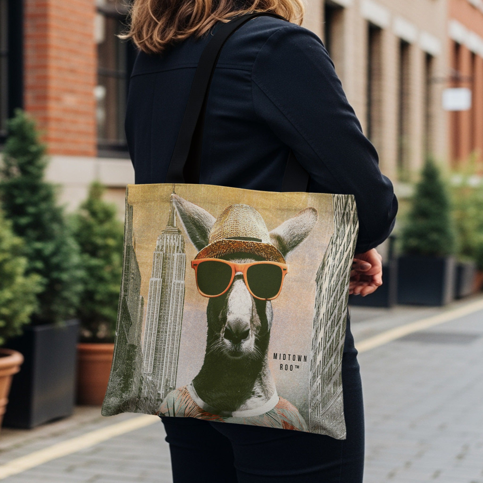 Tote bag with kangaroo wearing sunglasses and hat, New York City skyline behind.