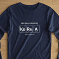 Navy long-sleeve t-shirt with "Football Chemistry" and "KoRe A" periodic table design.