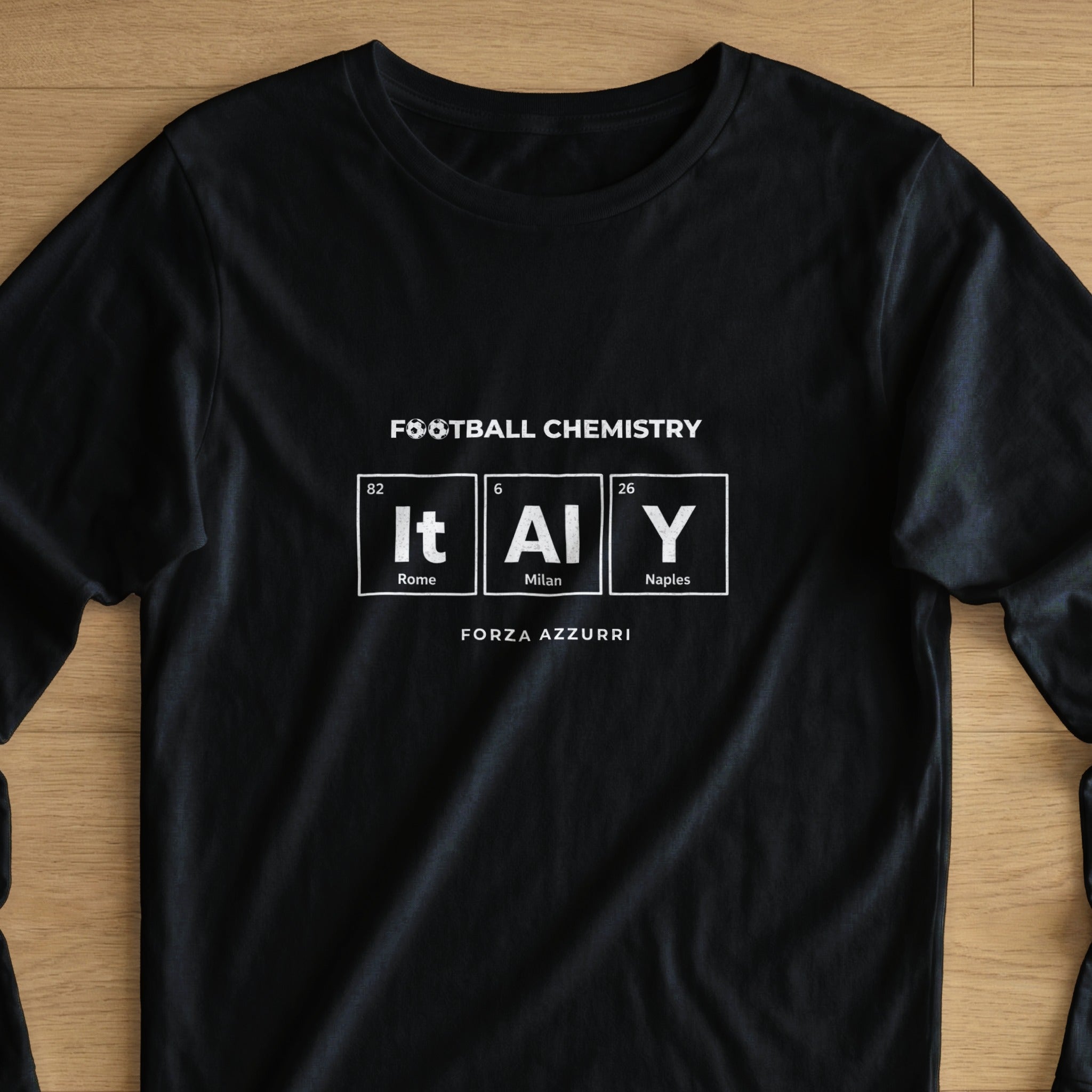 Black t-shirt with "Football Chemistry IT AL Y" in periodic table style.