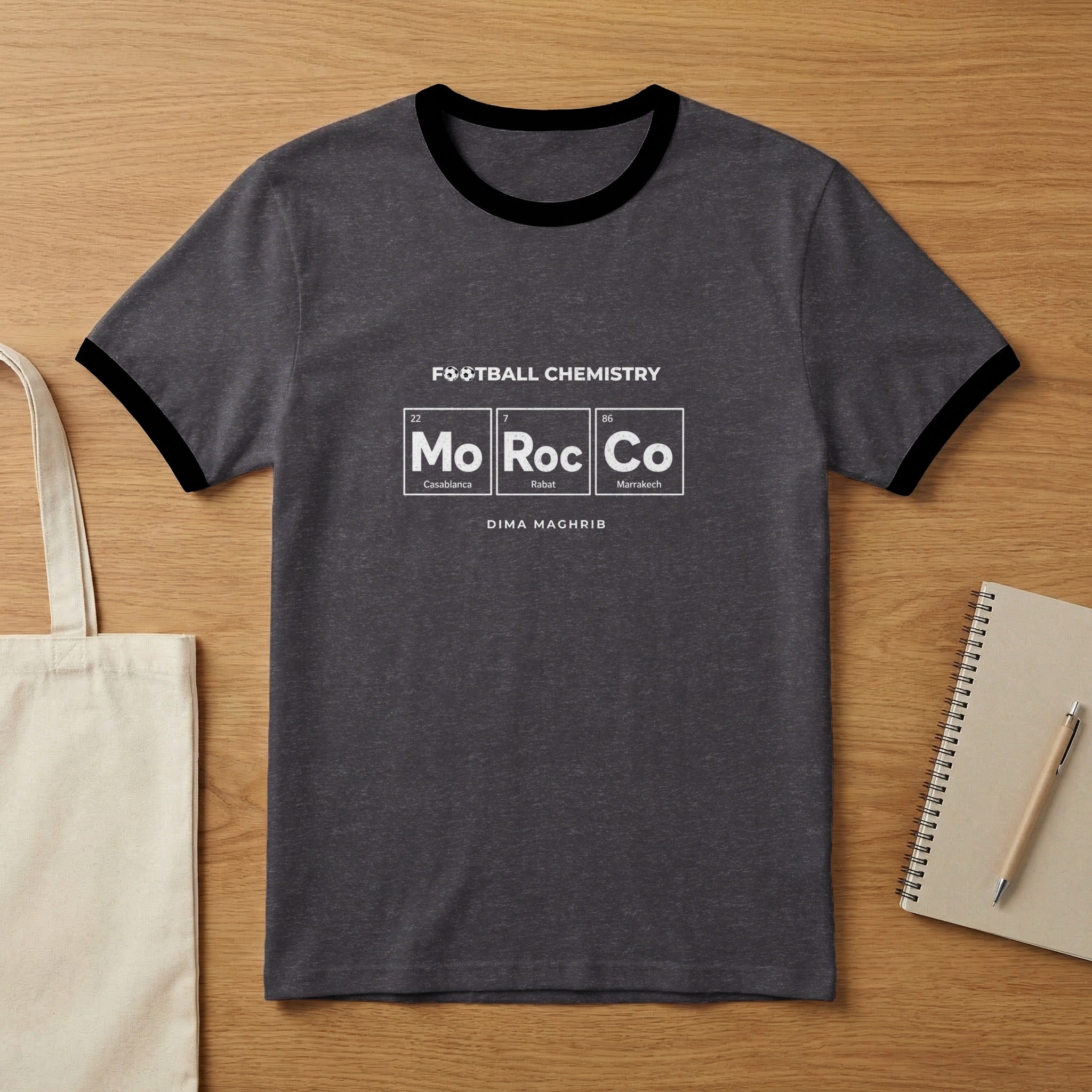 Dark grey ringer t-shirt with "FOOTBALL CHEMISTRY MoRocCo" printed on it.