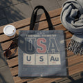 Tote bag with "USA Football Chemistry" design featuring periodic table elements.