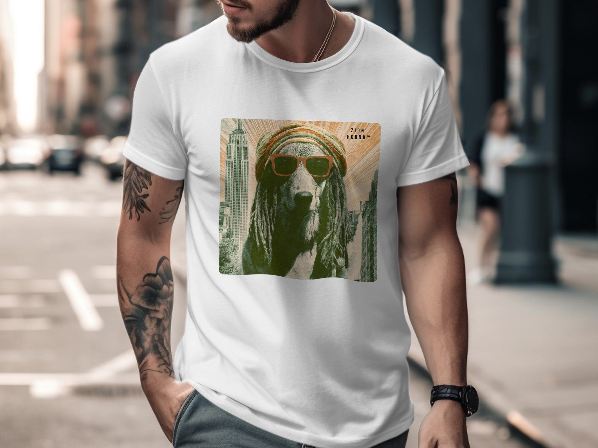 Man wearing white t-shirt with dog graphic wearing sunglasses and beanie.