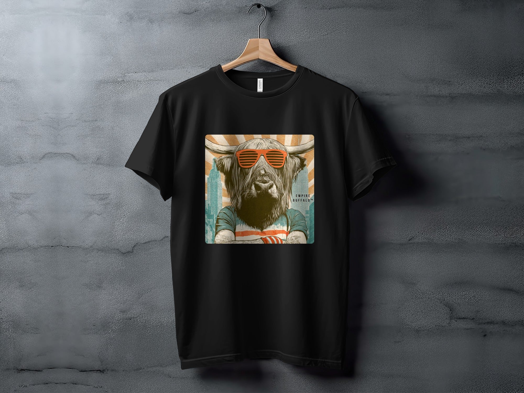Black t-shirt with graphic of a highland cow wearing sunglasses.