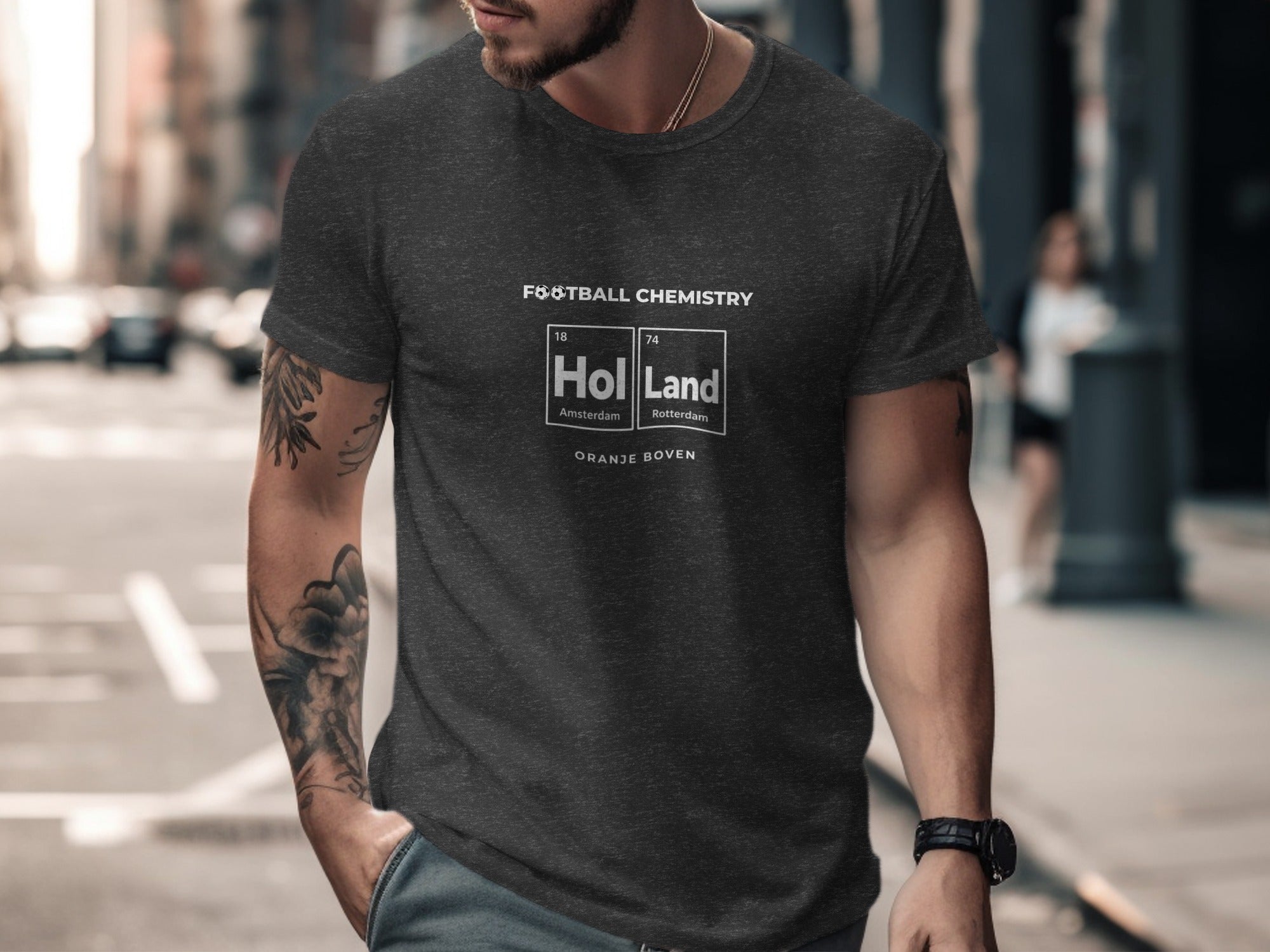 Dark t-shirt with "FOOTBALL CHEMISTRY HOL LAND" text, Amsterdam, Rotterdam.