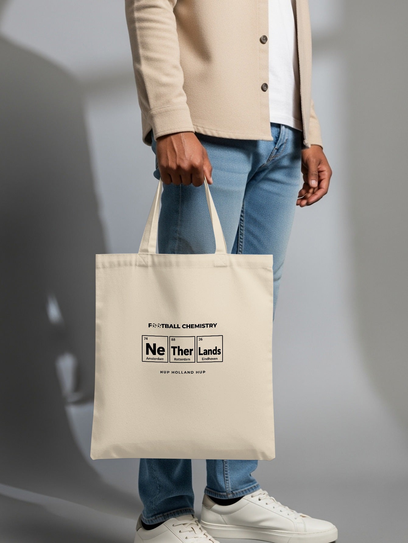 Cream tote bag with "Football Chemistry" and periodic table elements for Netherlands.