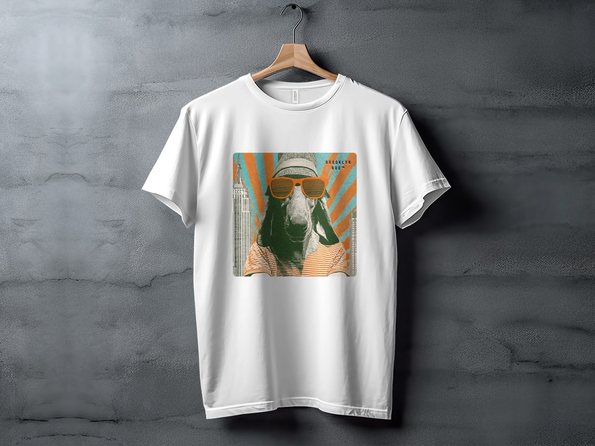 White t-shirt featuring a stylized goat wearing sunglasses and a hat with "Brooklyn" text.