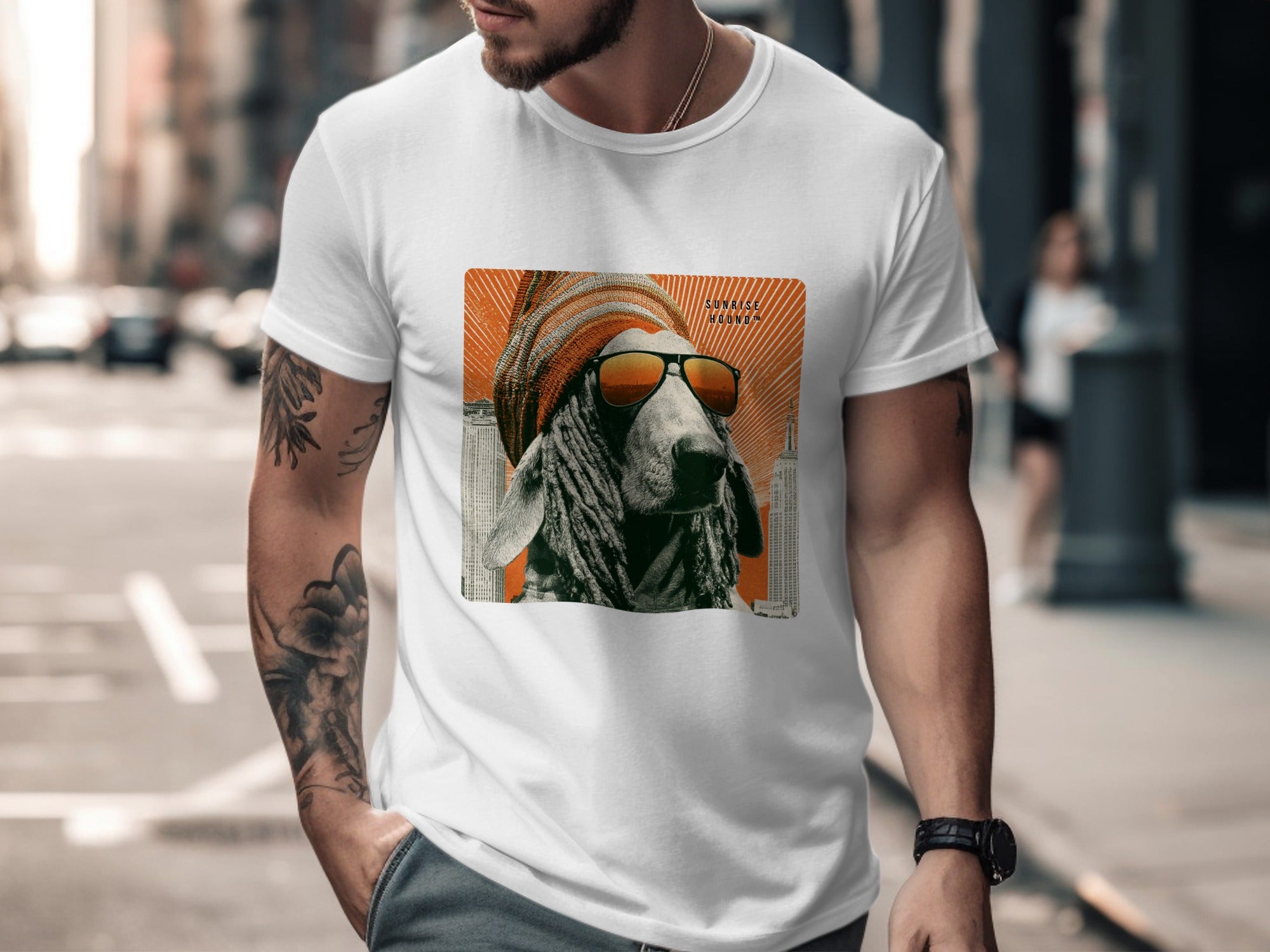 Dog wearing sunglasses and beanie on t-shirt, cityscape background.