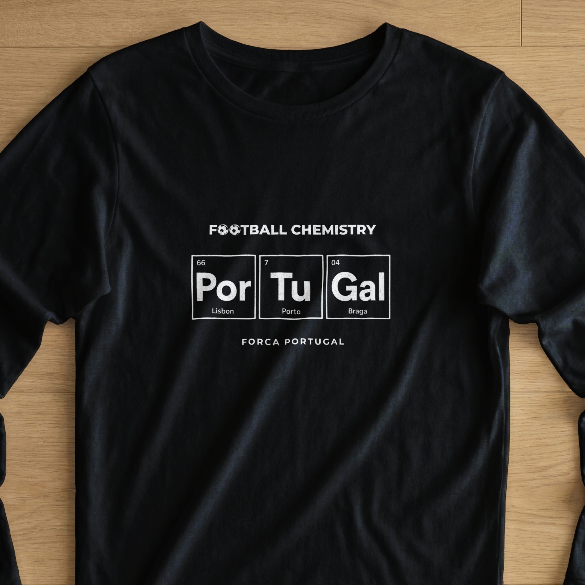 Black t-shirt with "FOOTBALL CHEMISTRY" and "FORCA PORTUGAL" in white.