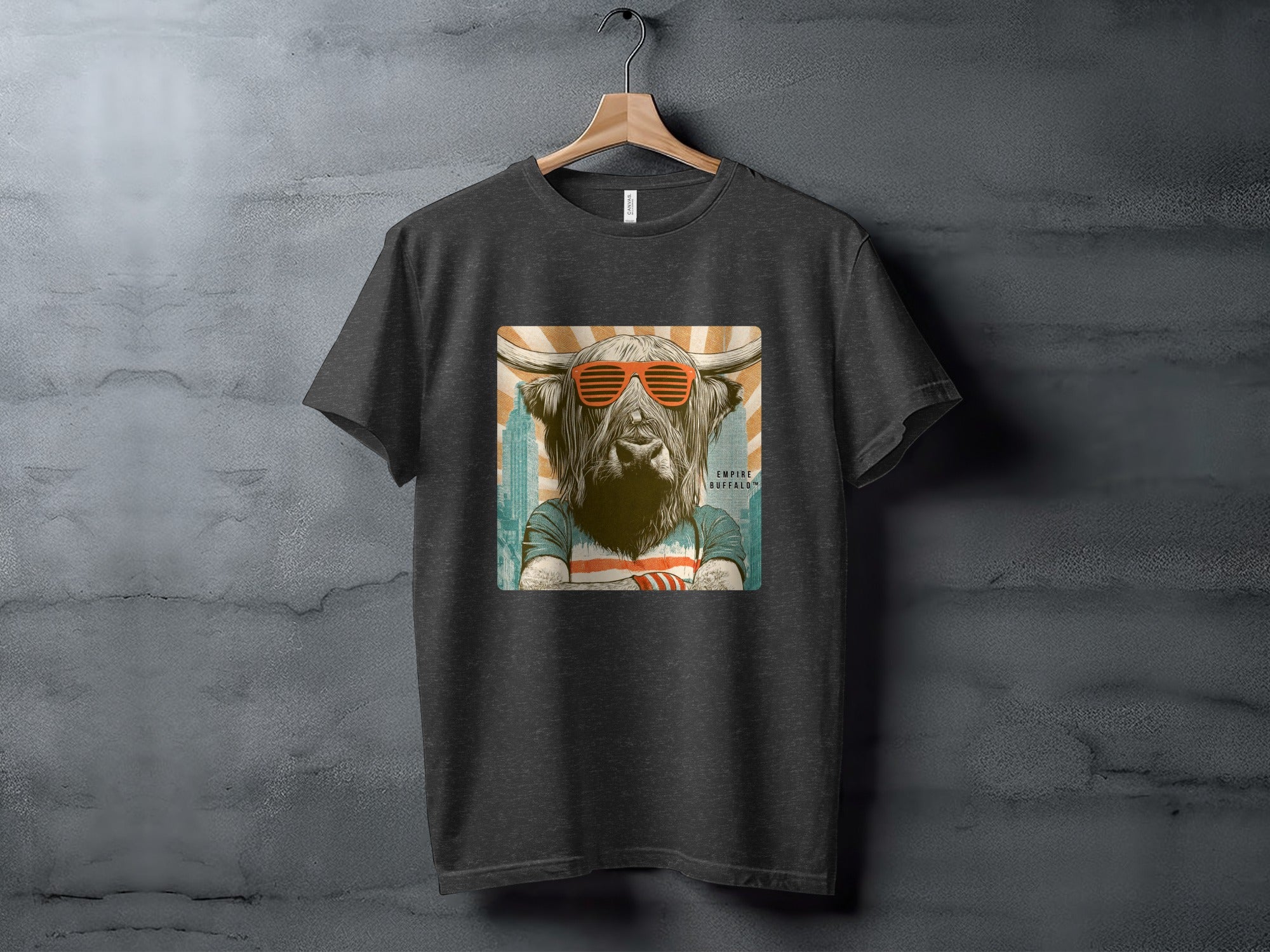 T-shirt with a graphic of a bull wearing sunglasses and a striped shirt.