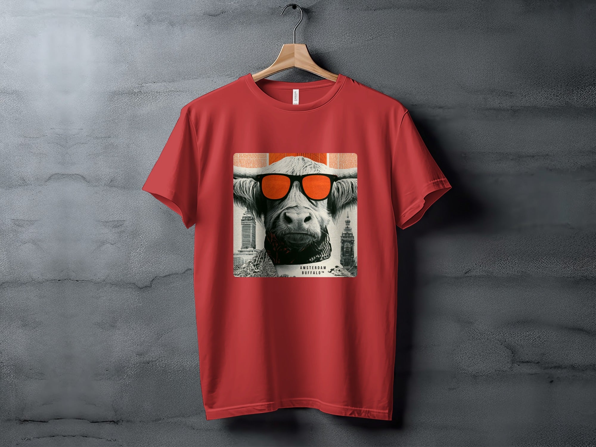 Red t-shirt featuring a stylized bull wearing sunglasses with Amsterdam landmarks.