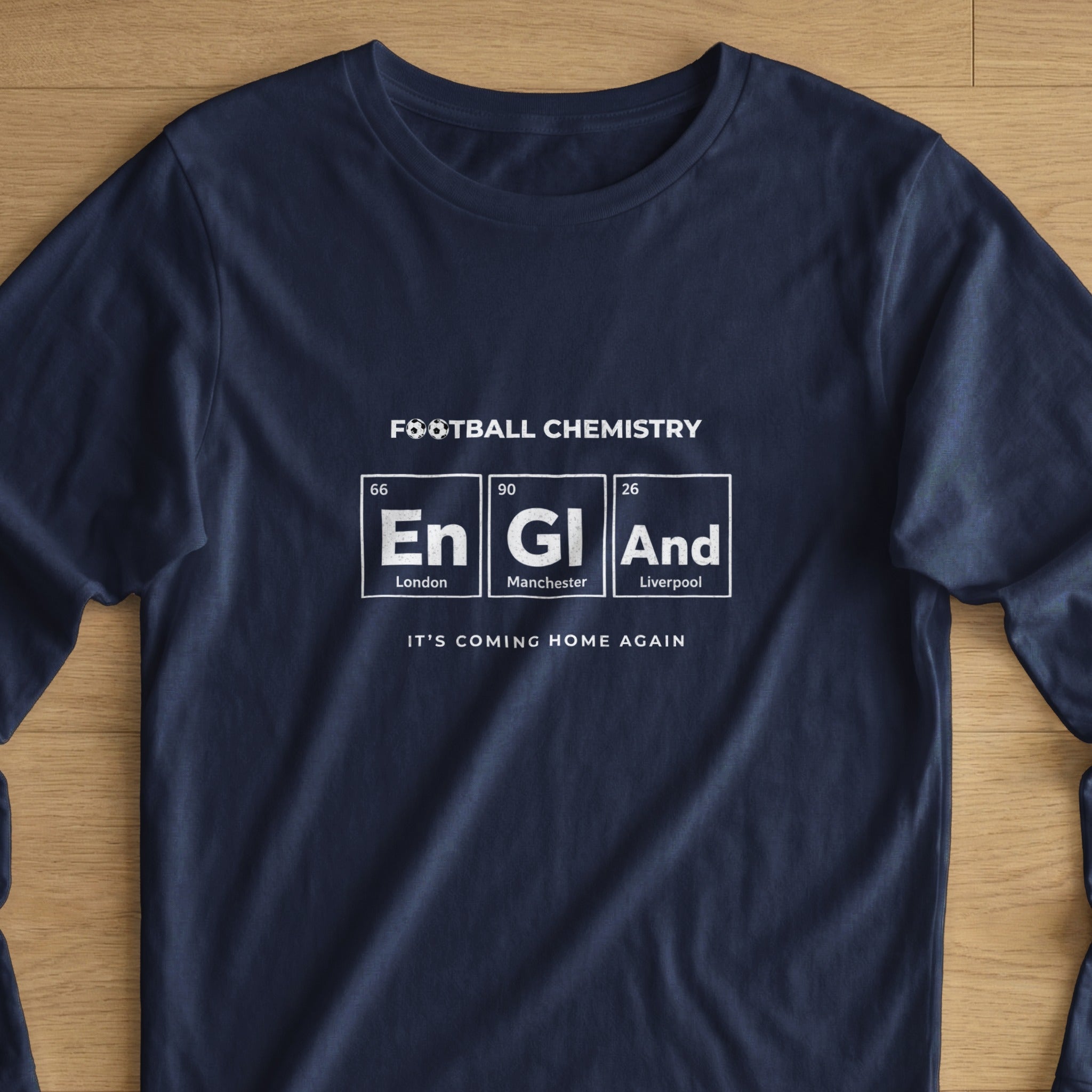 Navy long-sleeve t-shirt with "FOOTBALL CHEMISTRY" and England elements.