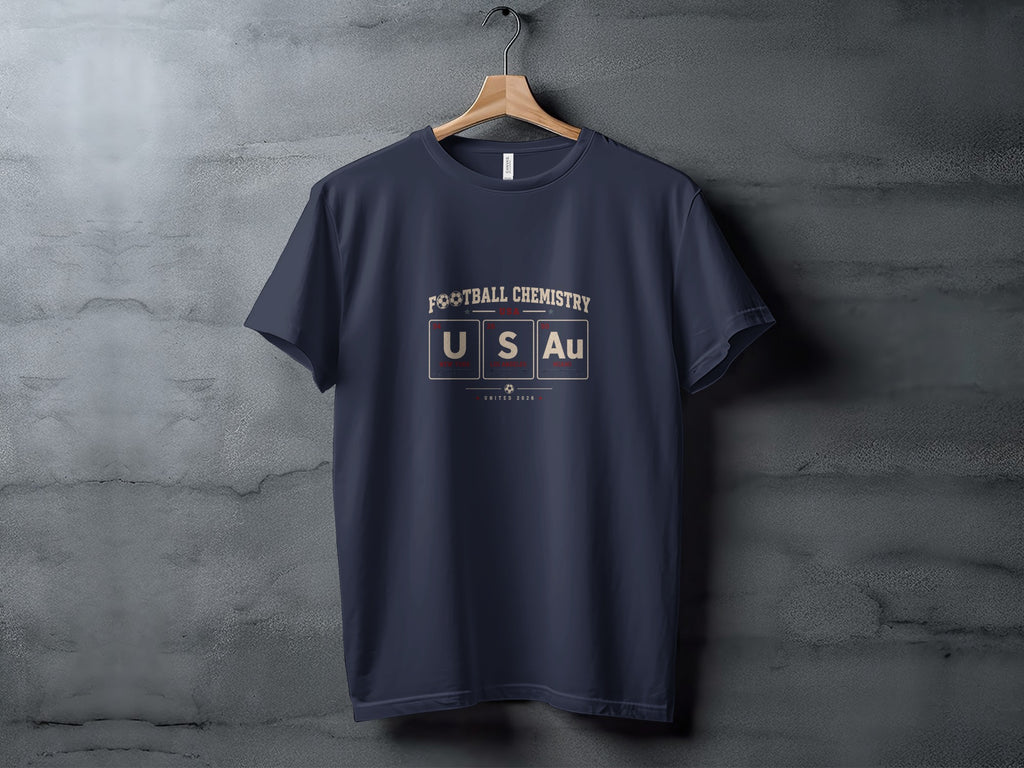 Navy t-shirt with "FOOTBALL CHEMISTRY USA" and periodic table elements U, S, Au.