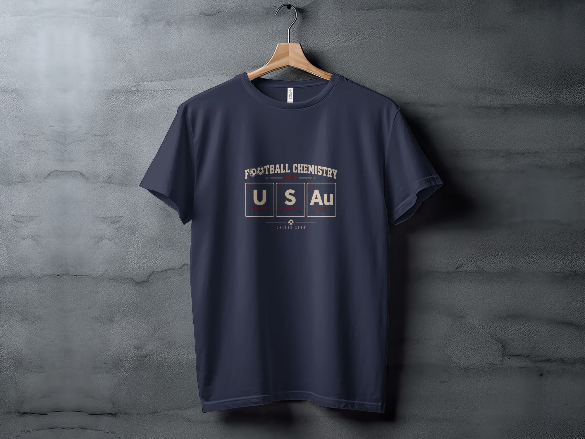 Navy t-shirt with "FOOTBALL CHEMISTRY USA" and periodic table elements U, S, Au.