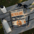 Notebook with "Football Chemistry Netherlands" cover and Dutch city names.