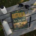 Notebook cover with "AUSTRALIA FOOTBALL CHEMISTRY" and team details.
