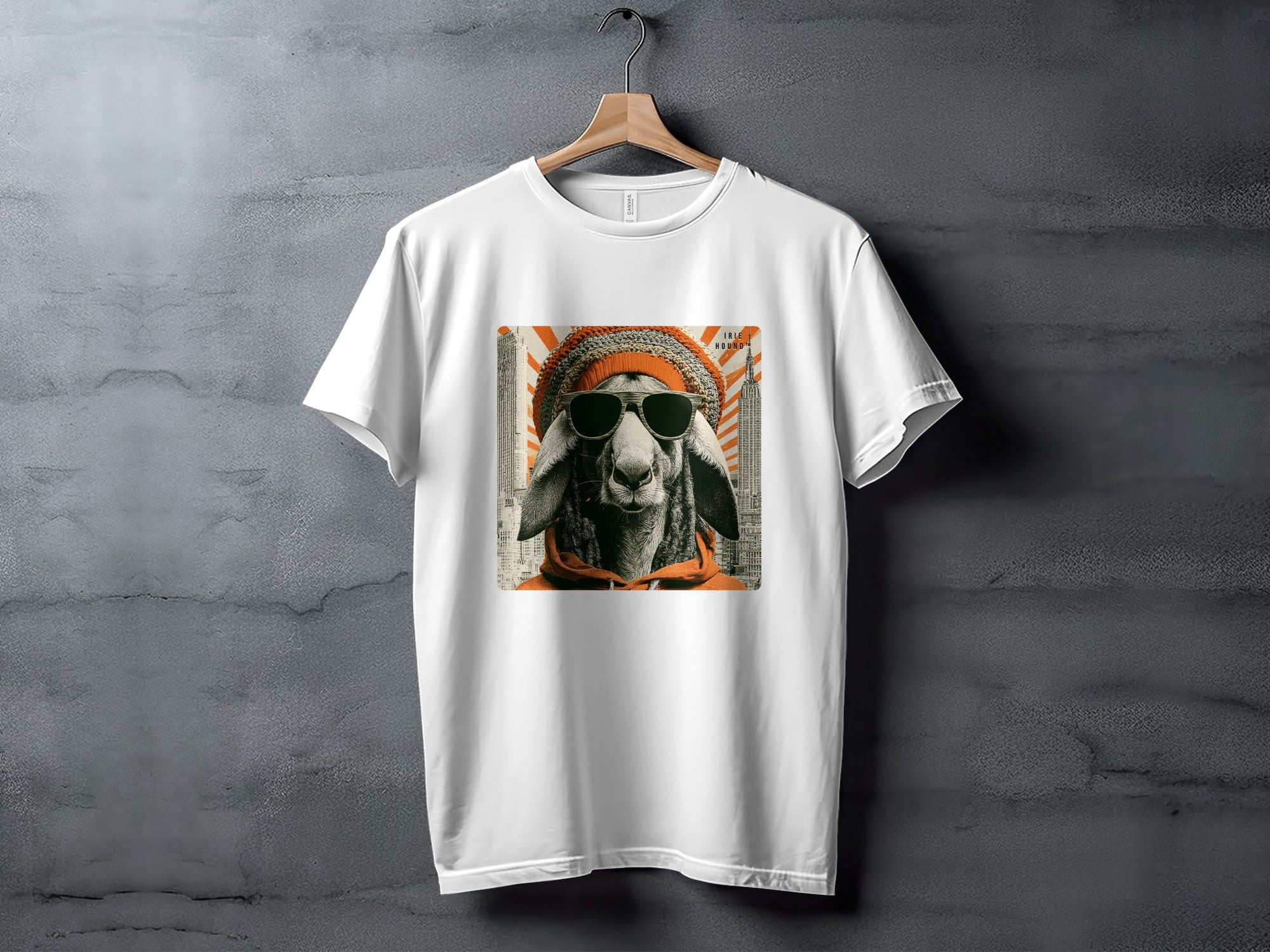 White t-shirt featuring a stylized sheep wearing sunglasses and a beanie, with a cityscape background.