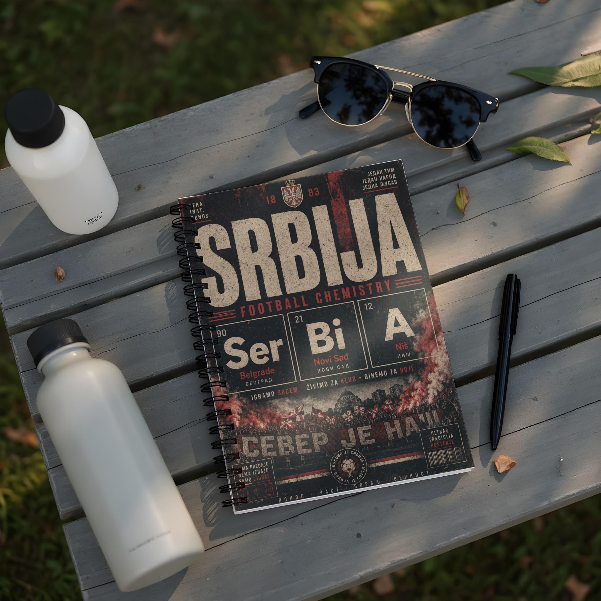 Notebook with "SRBIJA FOOTBALL CHEMISTRY" title and Serbian text.