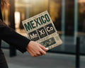Mexico national soccer team jersey with "Mexico" text and city names.
