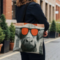 Tote bag featuring a Highland cow wearing sunglasses with city skylines.