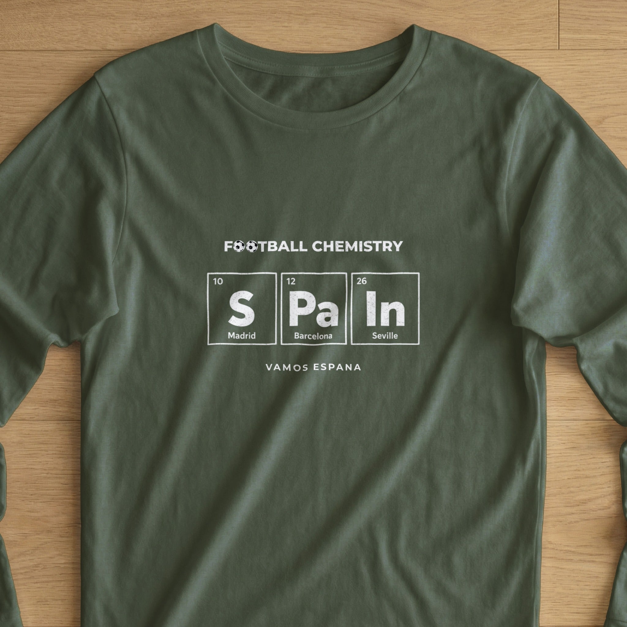 Olive green t-shirt with "FOOTBALL CHEMISTRY" and "Spain" in periodic table style.