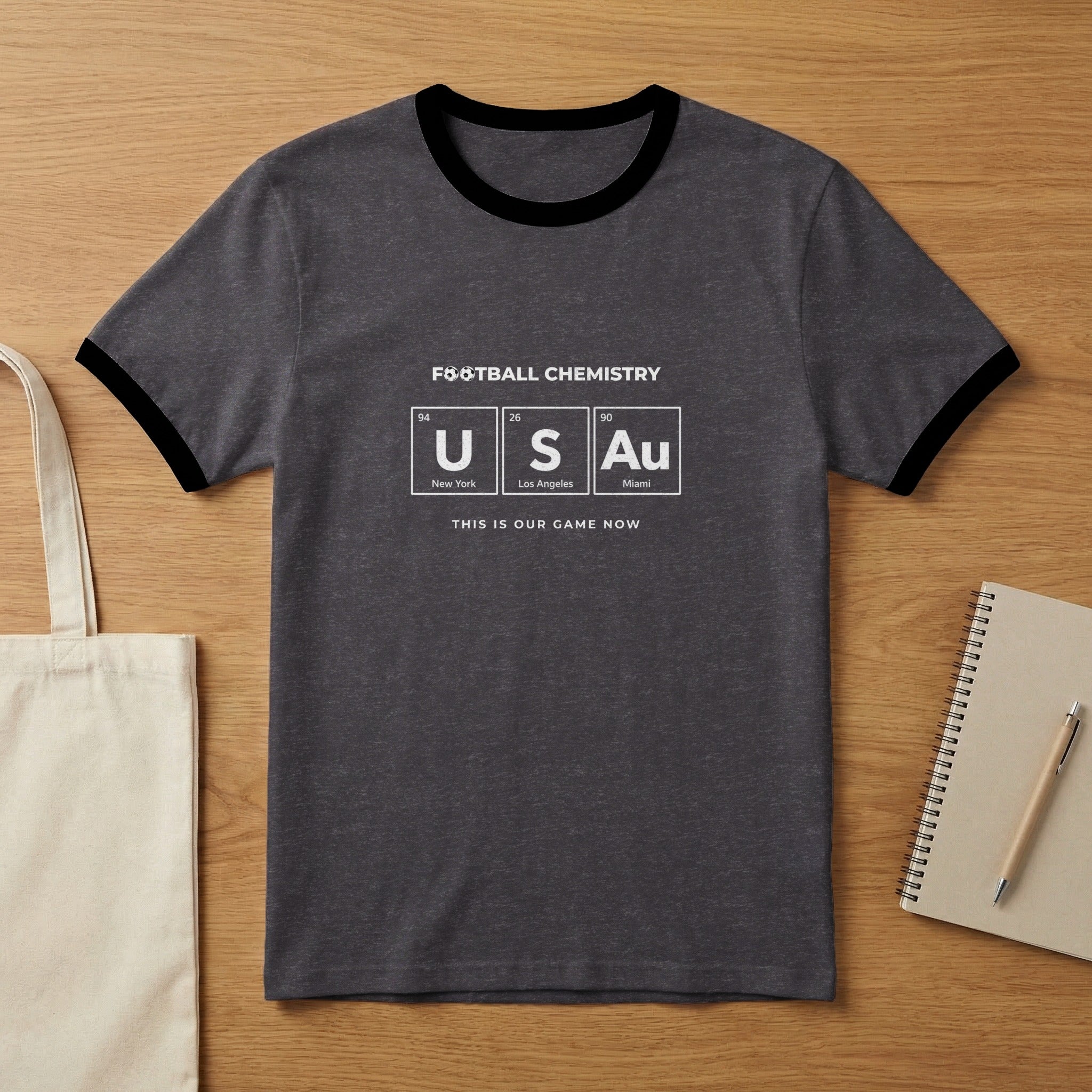 T-shirt with "FOOTBALL CHEMISTRY USAu" and periodic table elements.